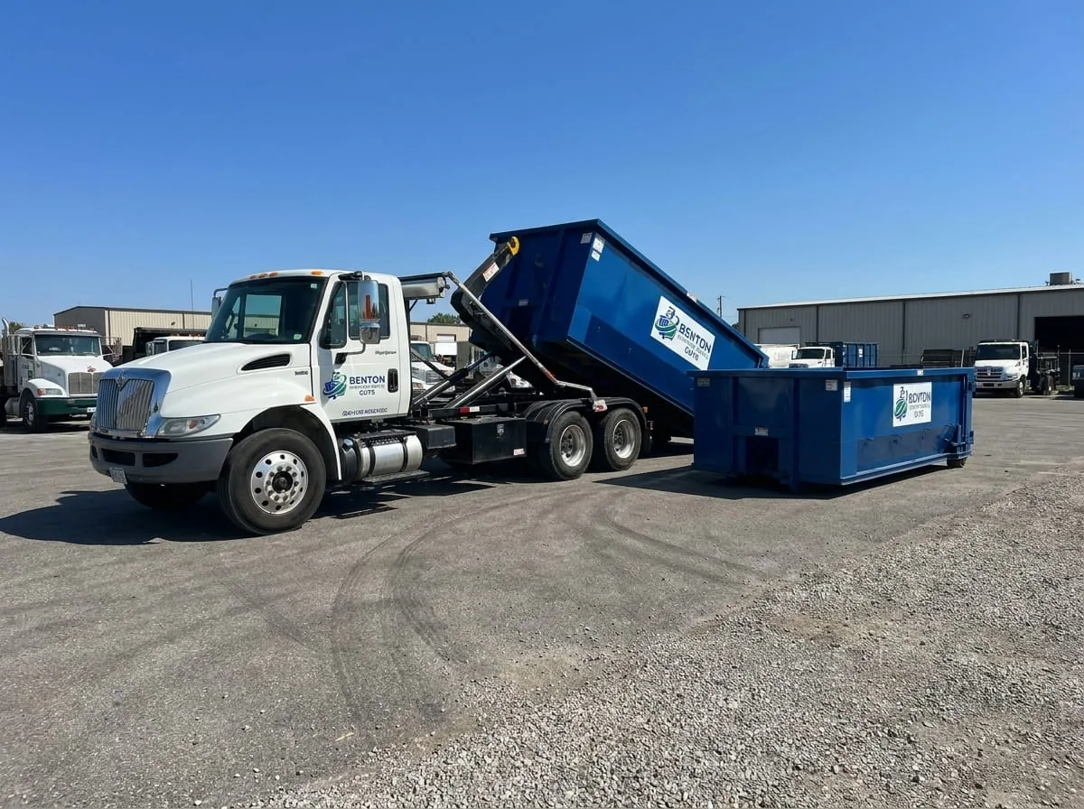 Roll-off dumpster loaded with broken concrete